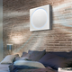 Illustration for article titled An Ultra-Flat Air Conditioner That Could Be Mistaken For Artwork